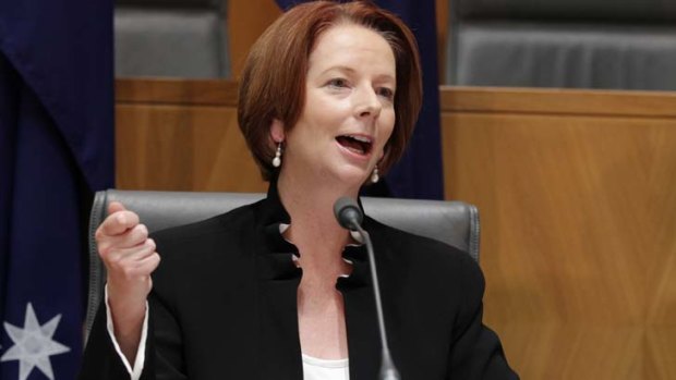 In too deep ... Julia Gillard can remain above the surface only so long as key crossbenchers maintain their support for the minority government.