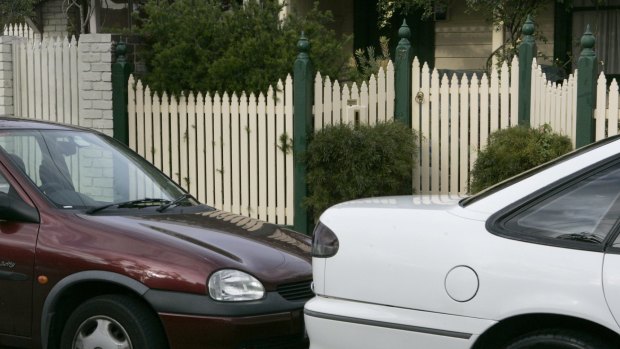 A Milton man was fined $90 for parking outside his own home. 