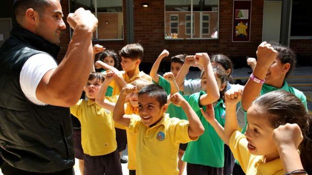 Aiming high: Fitness coach Christian Marchegiani and pupils from St Anne's Catholic primary school in Strathfield.