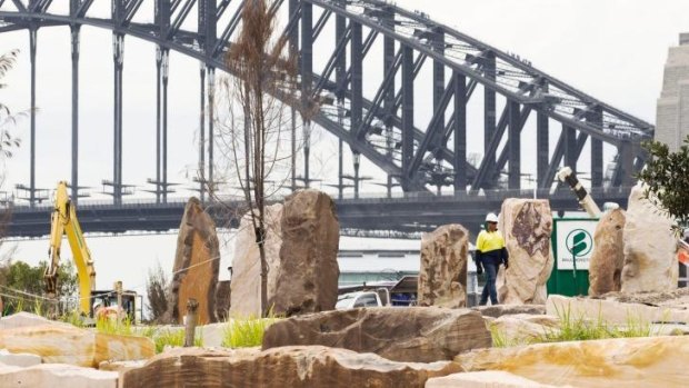 'Women ruled': Workers at the Stonehenge-style feature at Barangaroo which has prompted complaints from Aboriginal elders.