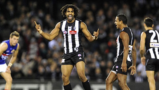 Harry O’Brien celebrates a goal on the run against the Western Bulldogs. He may be a future captain of the Magpies.