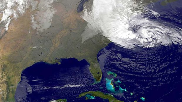 Hitting home ... a satellite image of Sandy on the east coast of the US.