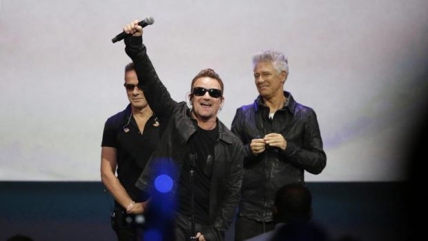 U2 frontman Bono (centre) at Apple's product launch last week.