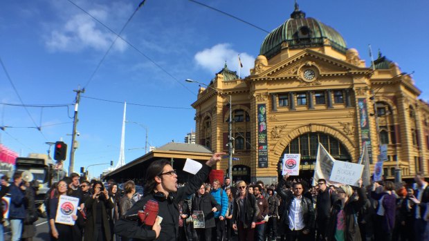 Ezekiel Ox leads the protest against Border Force in Melbourne on Friday afternoon.