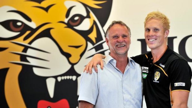 Steven Morris with his father, Kevin, who also played for the Tigers.