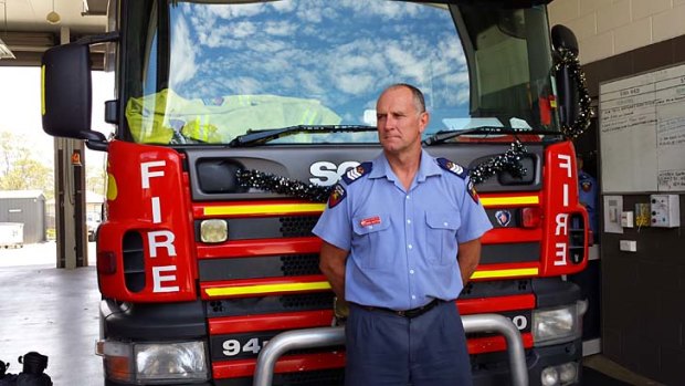 Firefighter Mark Dutton rescued two children from a fire which killed their mother.
