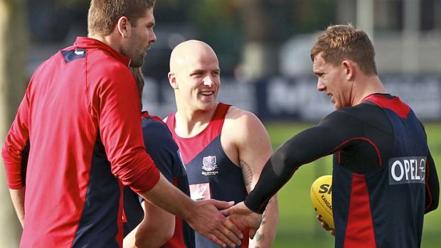 On the improve: Melbourne's Mark Jamar, Nathan Jones and Brent Moloney at training.