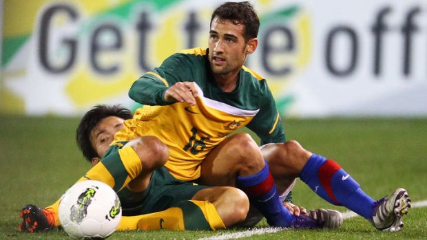 Socceroos player and Canberran Carl Valeri makes a challenge against Malaysia at Canberra Stadium in 2011.