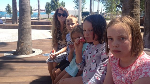 This Cottesloe family was unimpressed to find a bone-dry Elizabeth Quay water park on Friday.