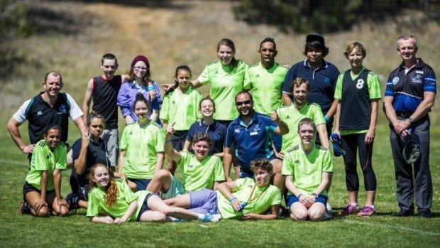 Ex Brumbies and Wallabies player Andrew Walker with the Melba Copland Secondary School handball team at the Inaugural Buroinjin Challenge to raise awareness of Indigenous suicide.