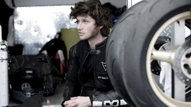 Love of speed ... Isle of Man racer Guy Martin prepares for the race.
