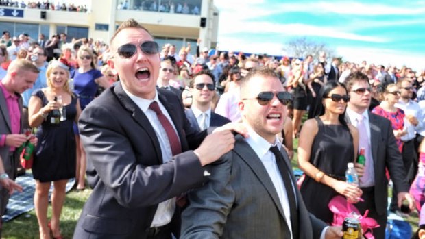 The crowd soak up the atmosphere at Caulfield yesterday.