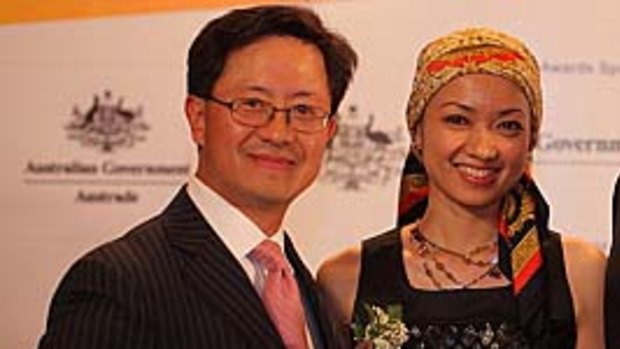 Charged ... Matthew Ng, pictured with his wife Niki Chow in 2009.