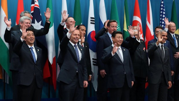 Prime Minister Tony Abbott poses with the G20 leaders for the family photo in Brisbane last September.