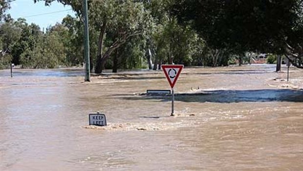 Flood waters rise in Patrick St, Dalby this week.