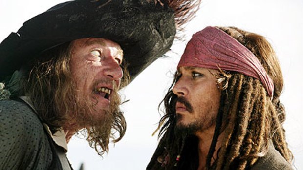Geoffrey Rush and Johnny Depp star in  Pirates of the Caribbean: At World's End.