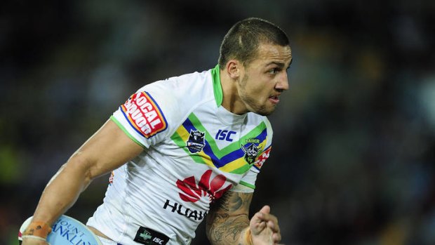 Blake Ferguson of the Raiders runs the ball during the round 16 NRL match between the North Queensland Cowboys and the Canberra Raiders at Dairy Farmers Stadium on June 23, 2012 in Townsville, Australia.