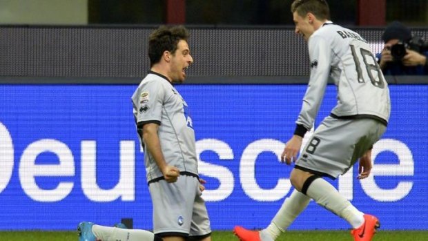Atalanta's Giacomo Bonaventura (left) celebrates with Daniele Baselli after scoring against Inter.