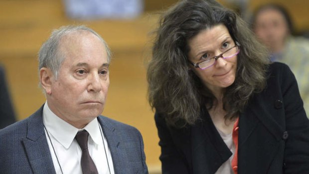 Singer Paul Simon and his wife Edie Brickell appear at a hearing in Norwalk Superior Court.