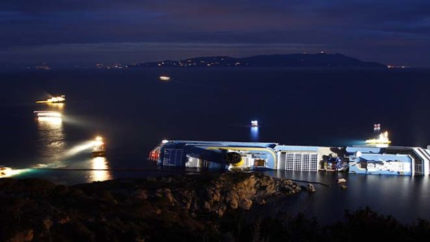 Disaster... The Costa Concordia lies on its side.