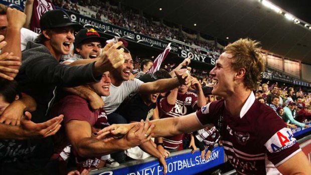 Cheer, cheer the maroon and white ... Daly Cherry-Evans with one-eyed Manly fans.