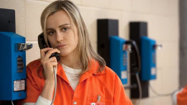 Phoning home: Taylor Schilling as Piper Chapman in Orange is the New Black.