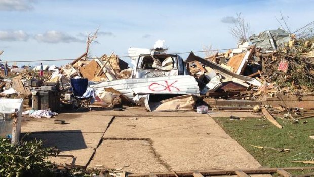 A home searched and marked clear of occupants in Moore, Oklahoma.