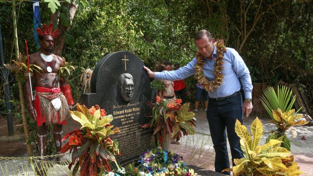 Prime Minister Tony Abbott lays a wreath at the grave of Eddie Mabo.
