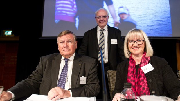 Max Moore-Wilton, left, incoming Sydney Airport chairman Trevor Gerber and chief executive Kerrie Mather at the AGM in Sydney on Thursday.
