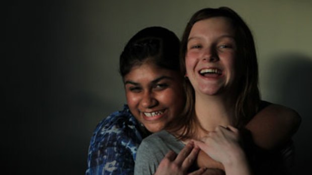 Movies, sleepovers and talking ‘‘about everything to each other’’ ... Best Buddies Harmanjot Kaur, 13, and Bree Grisedale, 15.