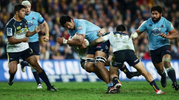 Man mountain: Will Skelton proves a handful for the Brumbies defence.