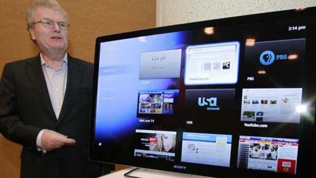 Sony CEO Howard Stringer stands near a Google TV display. Photo: AP/Paul Sakuma