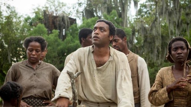Chiwetel Ejiofor, centre, in a scene from Steve McQueen <i>12 Years A Slave</i>, which also received seven Golden Globe Nominations.