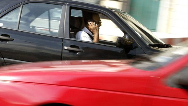 Queensland drivers may be facing stiffer penalties for using mobile phones while driving.