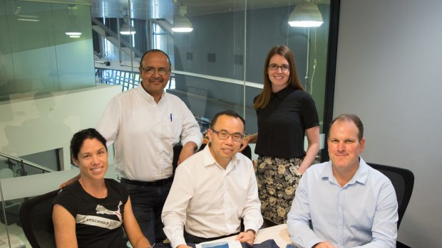 The winning team from Australia, led by Professor  Xungai Wang (centre). The prizemoney will go towards creating two complete garments within 12 months.

