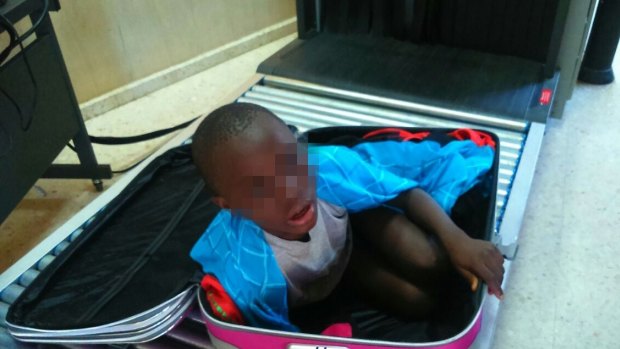 'My name is Abou' ... the Ivorian boy was carried in a suitcase by a young woman of 19 for about three hours before she was taken to border security authorities in Ceuta, the Spanish enclave in the north of Morocco.