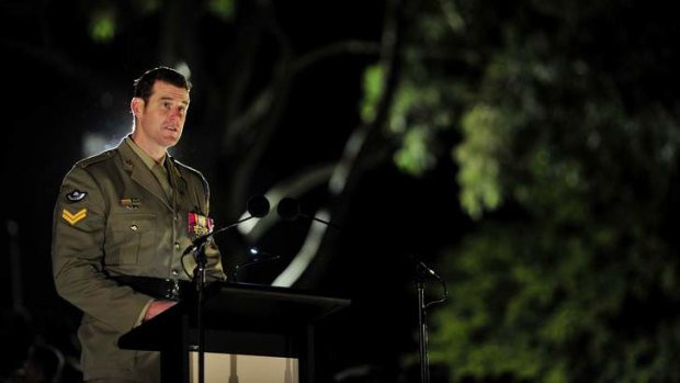 Corporal Ben Roberts-Smith VC MGl reads an emotive accounts of Australian service in Afghanistan at the Australian War Memorial Dawn Service.