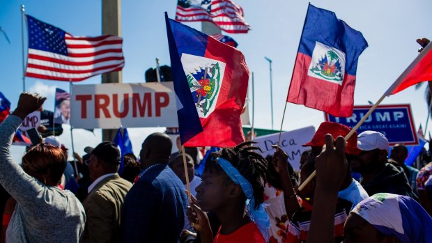 Demonstrators and Trump supporters amassed near Mar-A-Lago during Donald Trump's stay on the Monday holiday.