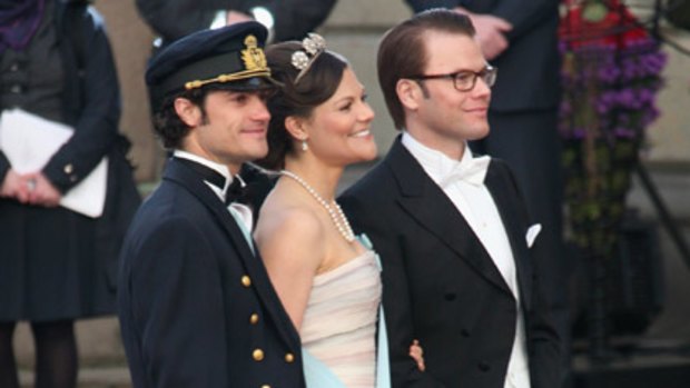 Crown Princess Victoria de Suede with two of the main men in her life, Prince Carl Philip of Sweden (topless model dater, racing car driver and nightclub regular and cutlery designer) and hubby-to-be Daniel Westling (glasses).