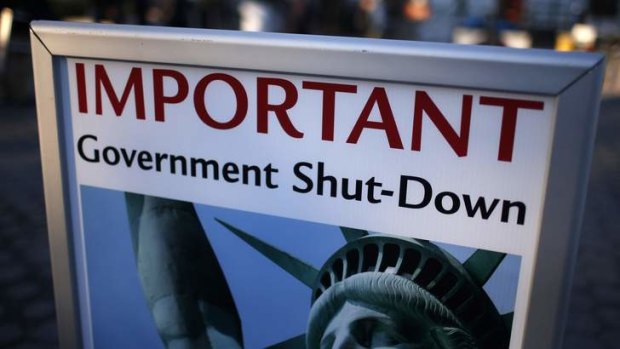 A sign announcing the closure of the Statue of Liberty, a US National Park, due to the US Government shutdown.