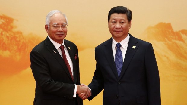 Najib Razak with China's President Xi Jinping  last year. 