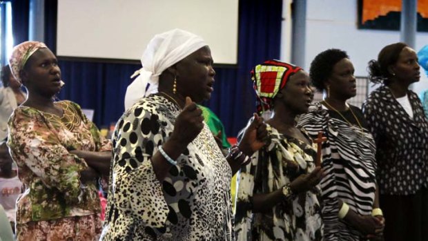 ''God kept us alive'' &#8230; the Sudanese community worships at Quakers Hill Anglican Church.