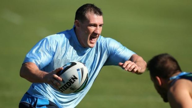 NSW skipper Paul Gallen goes for a run during Blues training in Coffs Harbour on Thursday.