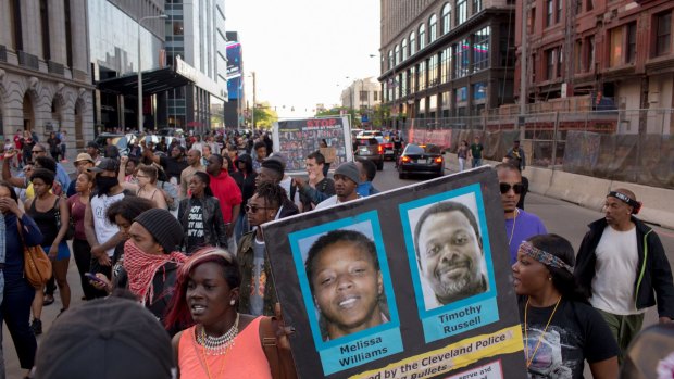 People take to the streets after Cleveland police officer Michael Brelo was acquitted of manslaughter charges after he shot two people following a 2012 car chase in which officers fired 137 shots.