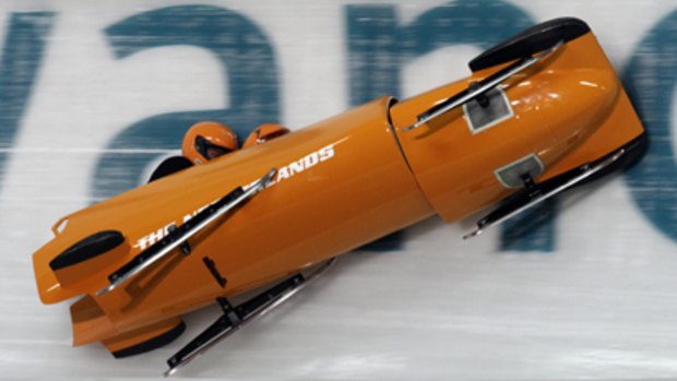 The Dutch bobsled, piloted by Edwin van Calker, crashes during a men's two-man bobsled training run last week.