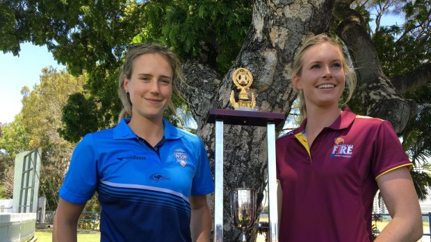 NSW Breakers Ellyse Perry with Queensland's Holly Ferling before the final.