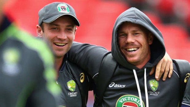Phil Hughes (left) with the man who replaced him in the Australian team, David Warner.