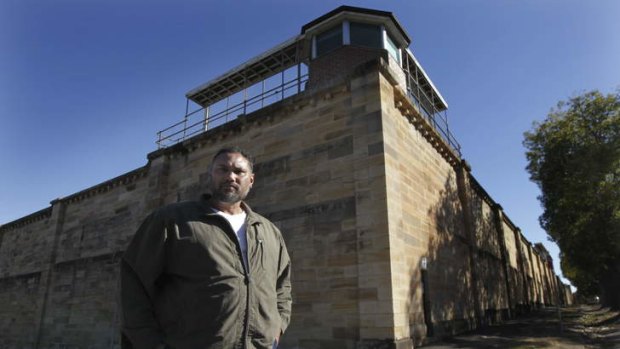David Leha in front of the Parramatta Correctional Centre, will share his insights with young Victorians this week.