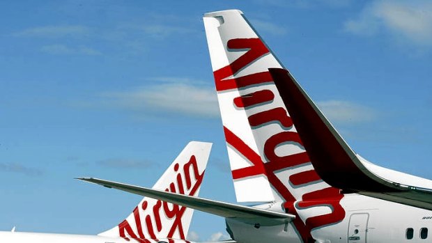 Virgin Australia has, for the first time, overtaken Qantas for the number of domestic passengers carried over a 12-month period.