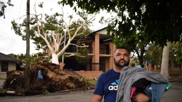 Moustafa Noureddine, his wife and five children were in their Ingram Avenue home in Bankstown when a big gum fell on the house.